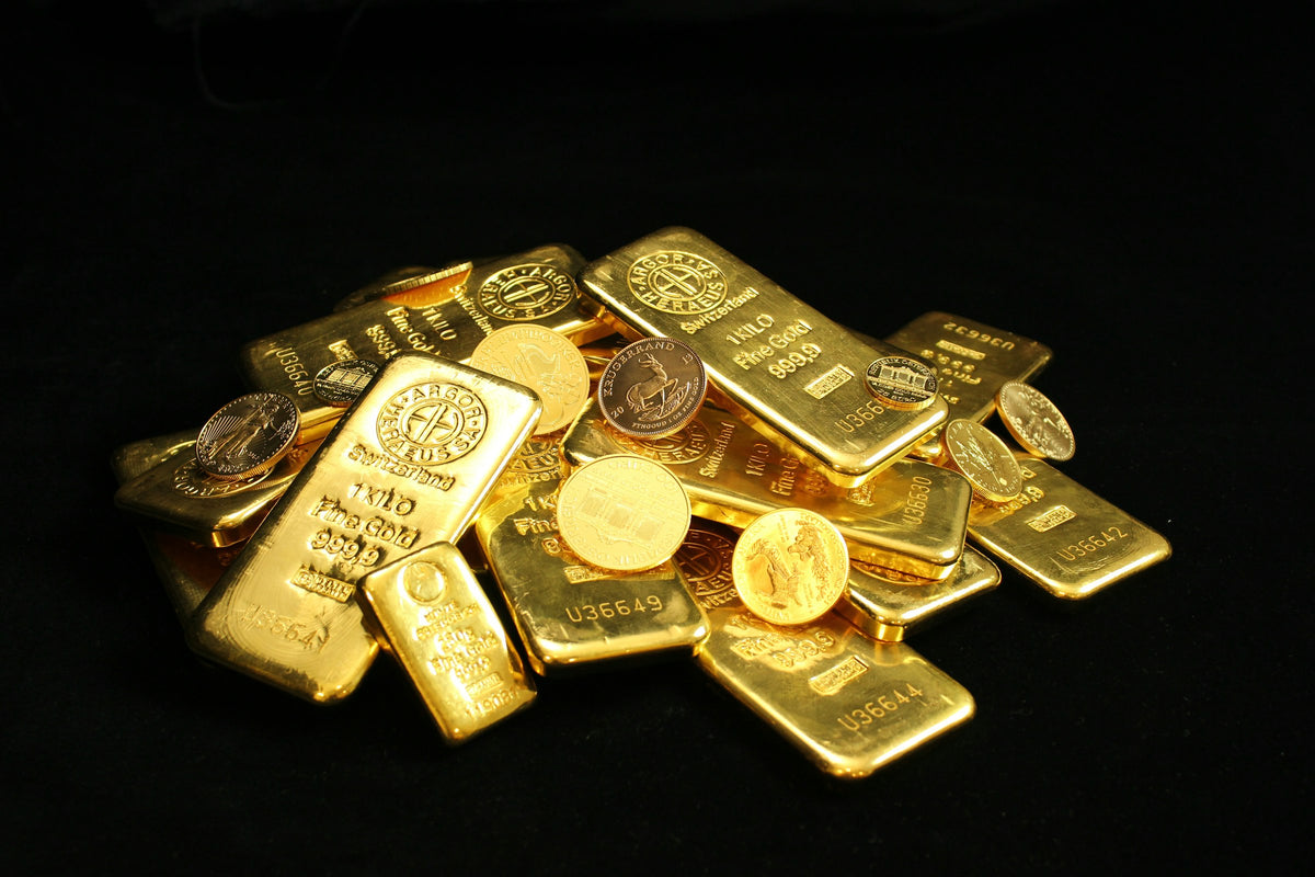 Goldbarren und Goldmünzen